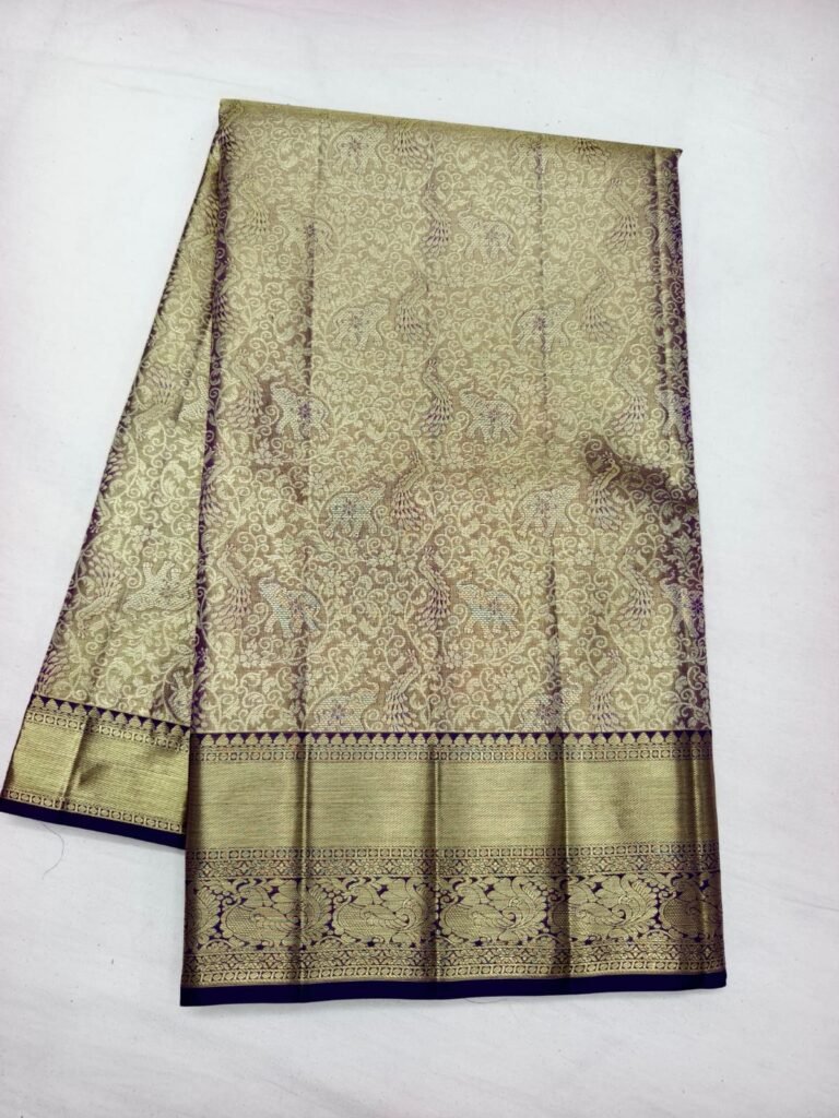 Antique gold Dharmavaram handloom pattu saree with peacock brocade and a navy blue gold zari border