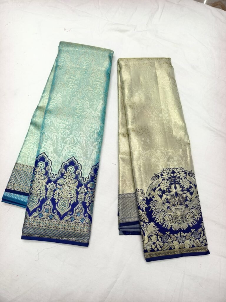 Two Dharmavaram silk sarees from the Ramanji Handlooms collection, aqua and cream gold with navy zari pallus