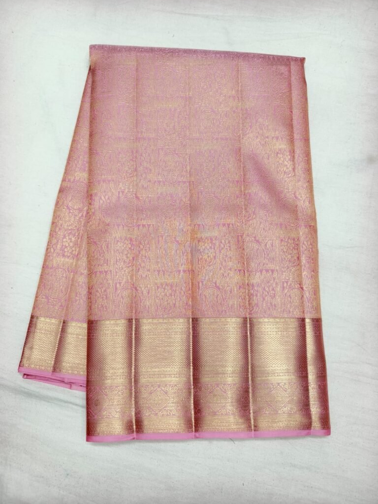 Blush pink Dharmavaram pattu saree with fine gold brocade and a broad gold zari border