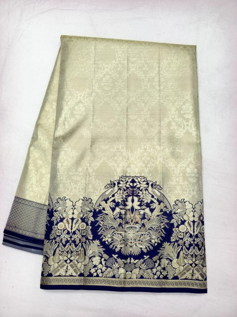 Cream gold Dharmavaram wedding silk saree with fine floral brocade and a navy blue gold zari medallion pallu