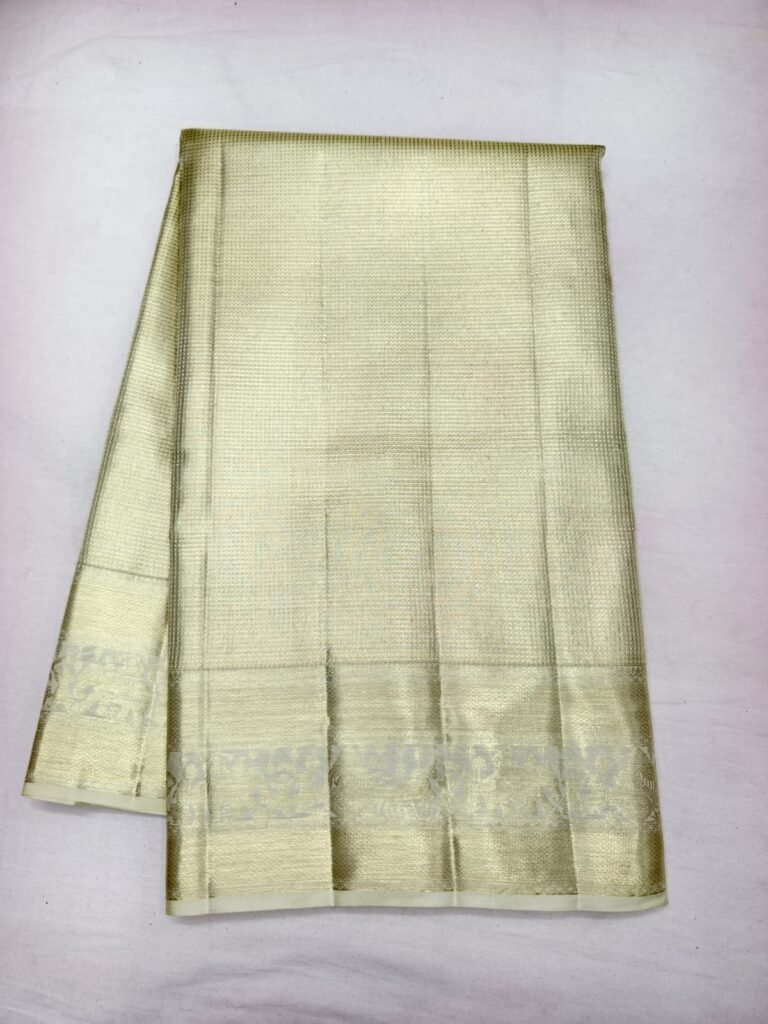 Ivory gold Dharmavaram silk saree with tissue check weave and a tone on tone gold zari border