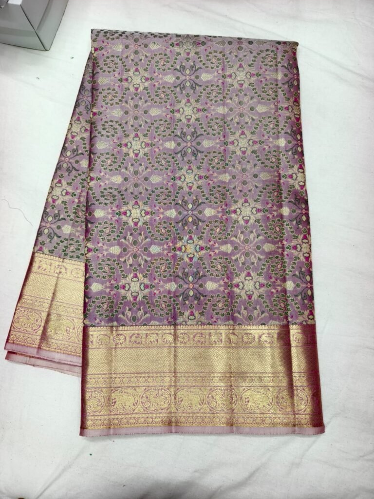 Lavender Dharmavaram silk saree with all over gold jaal brocade and a broad gold zari border