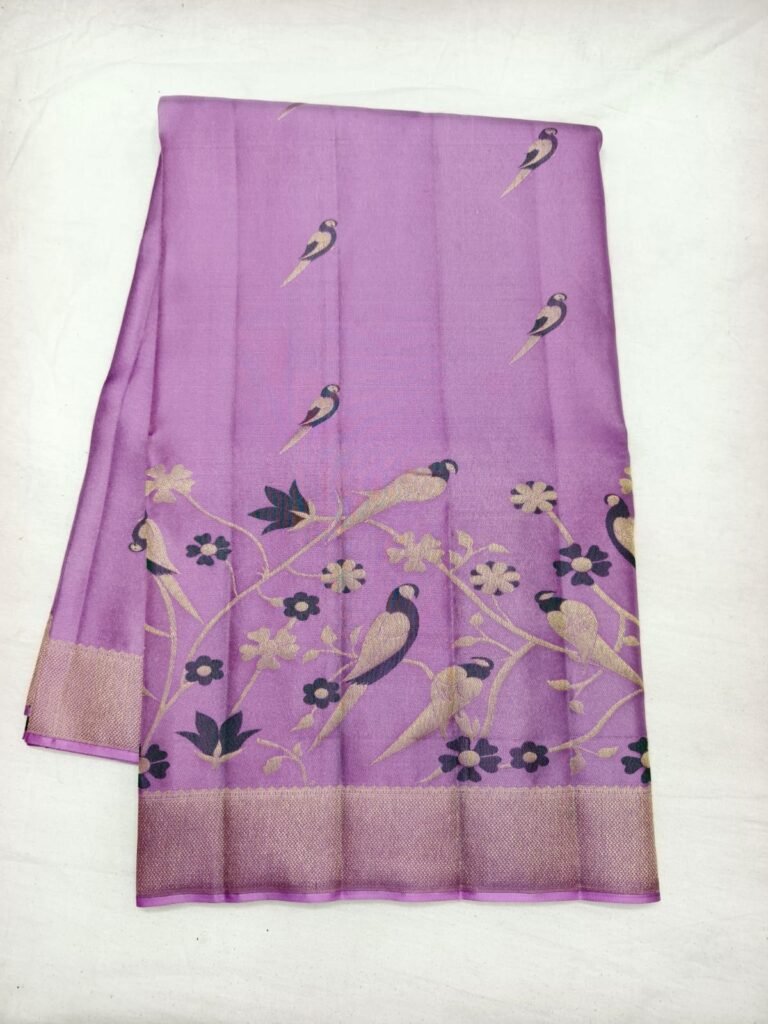 Lavender Dharmavaram pattu saree with scattered parrot motifs and a floral bird pallu in gold zari