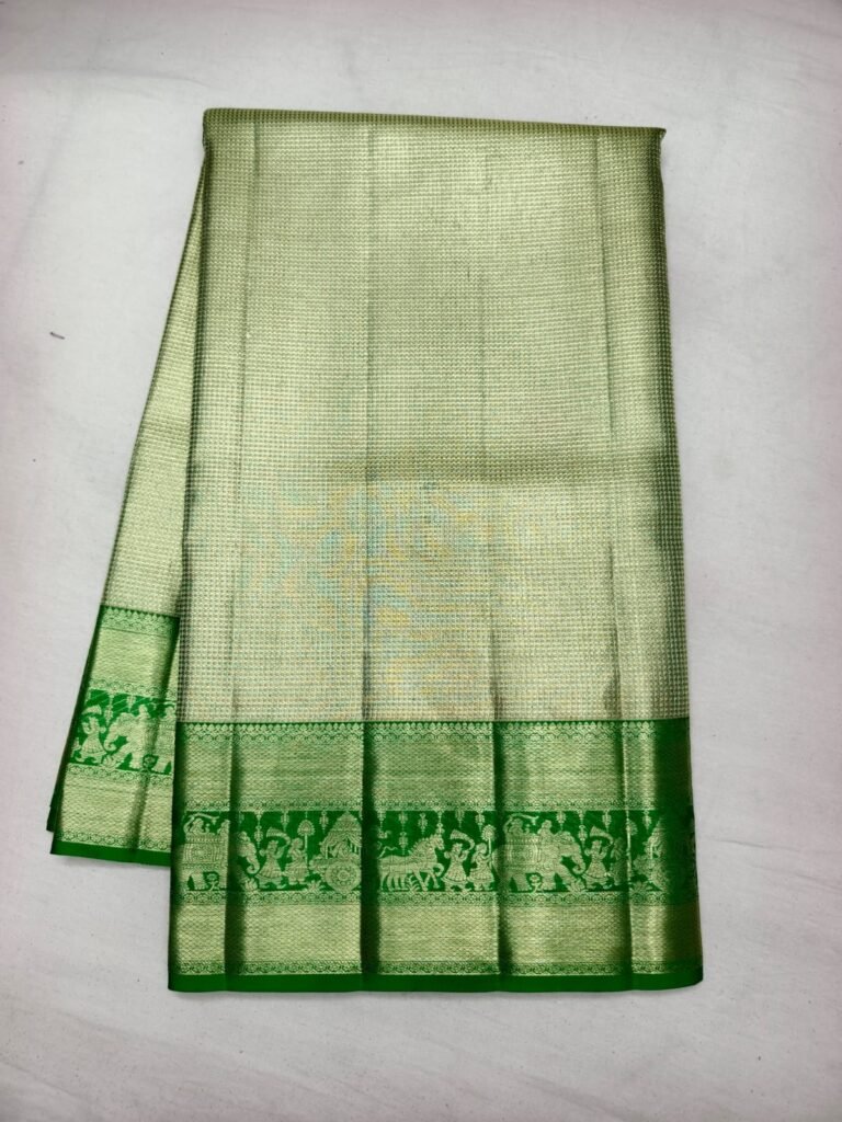 Light green Dharmavaram pattu saree with check weave and a green zari border with temple figure band