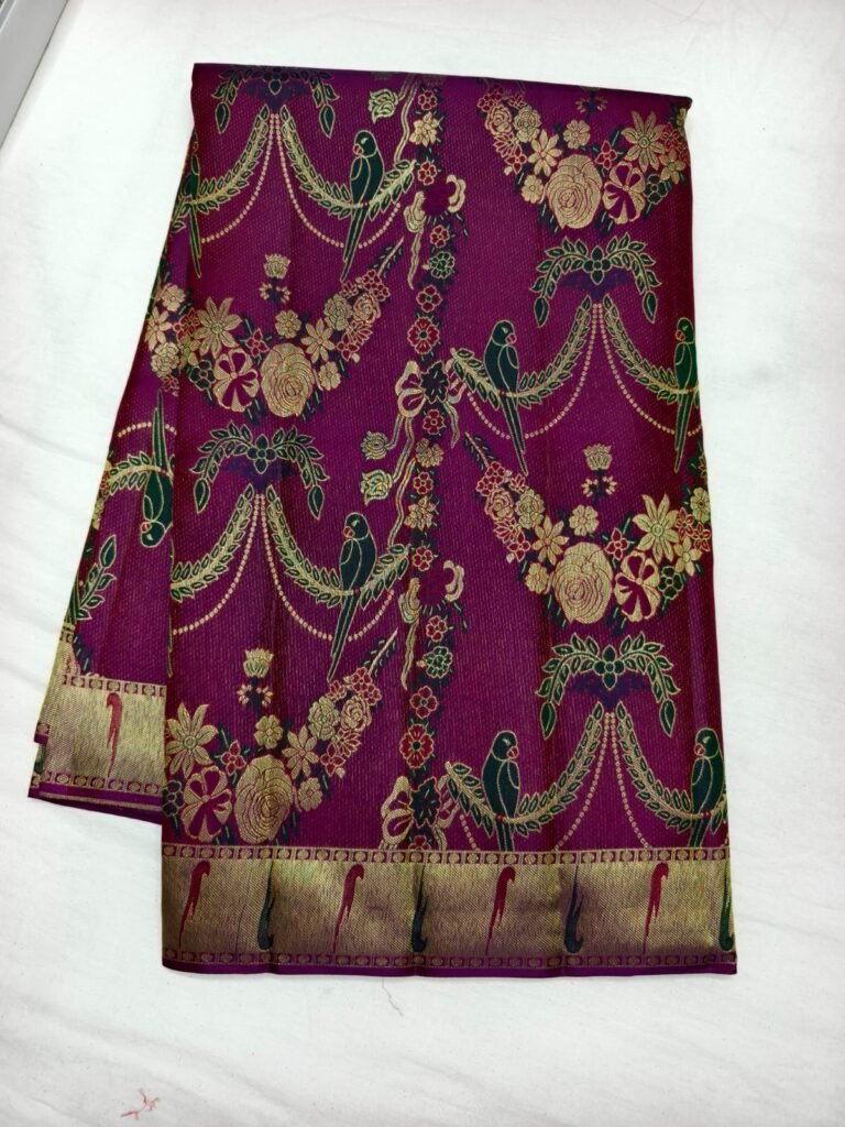 Magenta Dharmavaram meenakari saree with green parrots and multicolour floral garland motifs