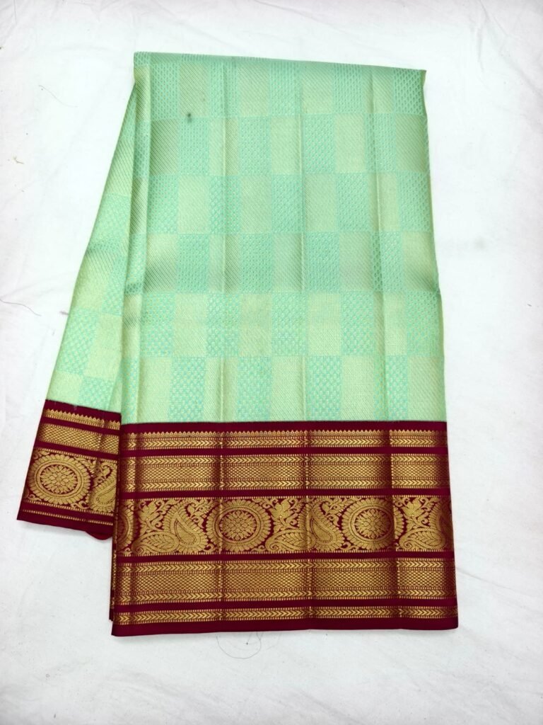 Mint green Dharmavaram handloom pattu saree with square check brocade and a maroon peacock zari border