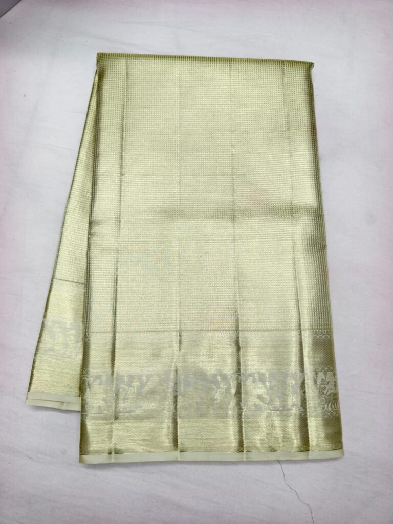 Pale gold Dharmavaram pattu saree with fine check weave and a tone on tone gold zari border