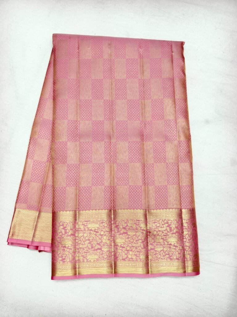 Pink Dharmavaram handloom pattu saree with gold check brocade and a zari border with woven figures
