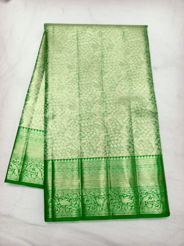 Pista green Dharmavaram silk saree with gold floral brocade and a bright green zari border