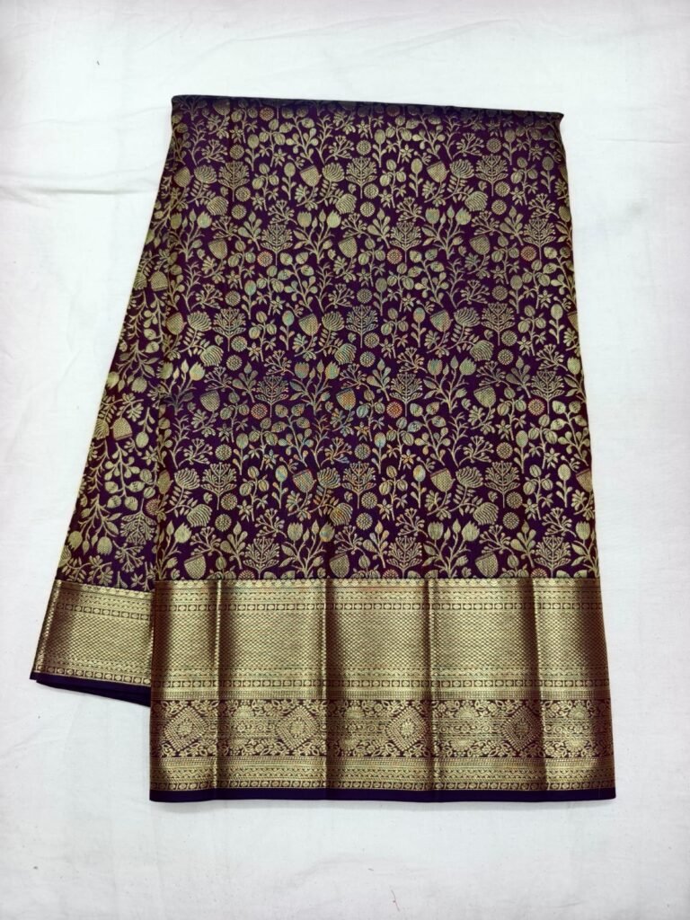 Purple Dharmavaram bridal silk saree with all over gold floral vine jaal and a broad gold zari border