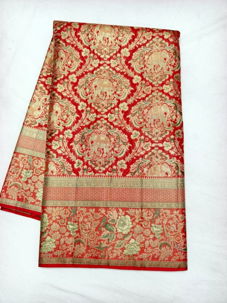 Red Dharmavaram bridal saree with large damask medallions, elephant motifs and a gold floral border
