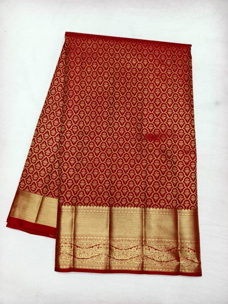 Red Dharmavaram butta saree with dense gold butta jaal brocade and a broad gold zari border