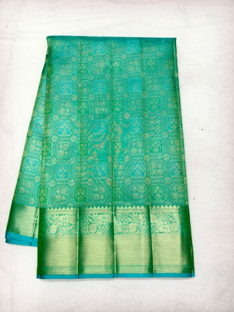 Teal Dharmavaram silk saree with gold square grid brocade and a broad green gold zari border