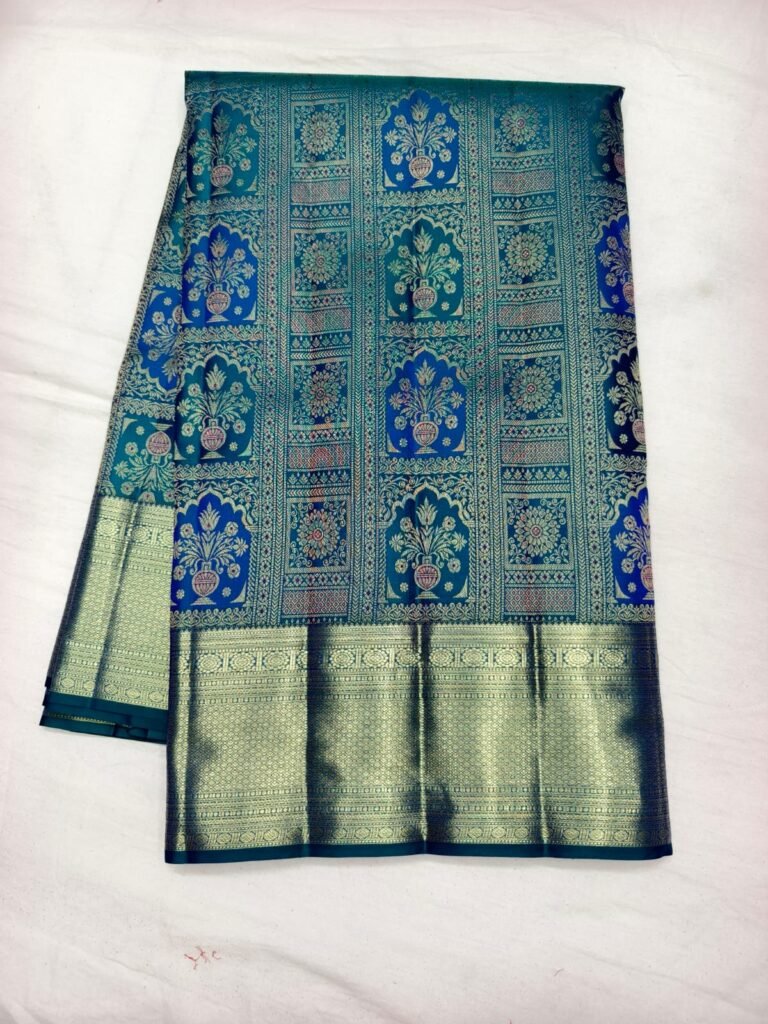 Teal Dharmavaram bridal silk saree with mughal vase and arch grid brocade and a broad plain gold border