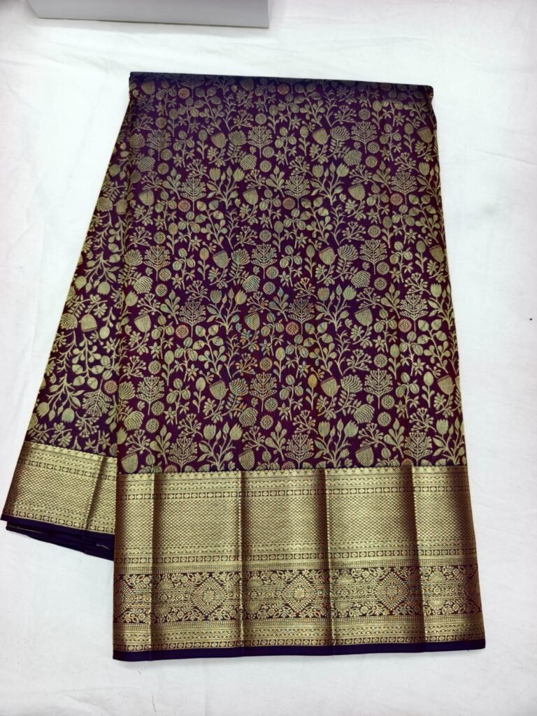 Wine purple Dharmavaram handloom pattu saree with gold floral creeper jaal and a broad zari border